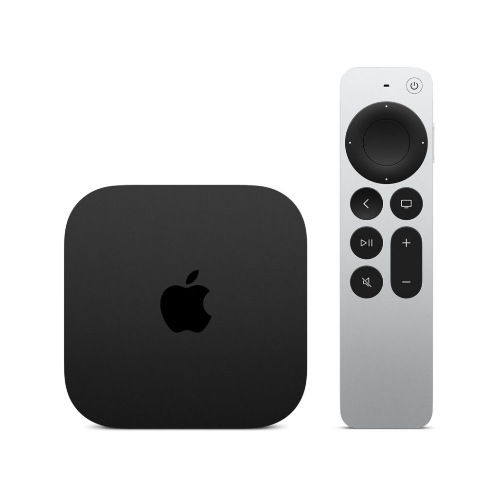 Apple TV 4K box in black next to an aluminum remote control. 